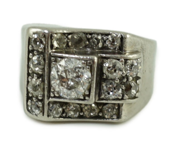 An Art Deco platinum? and diamond cluster set dress ring